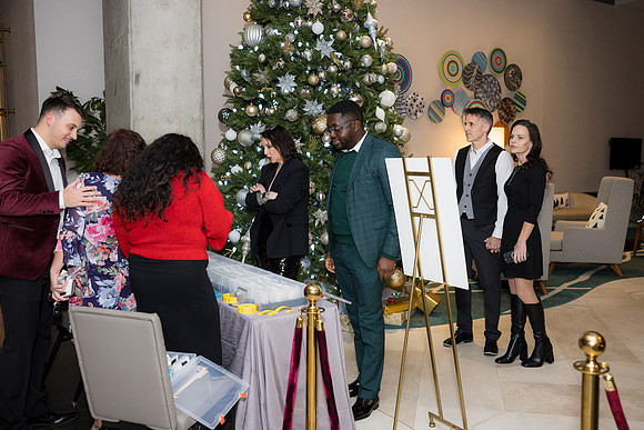 0077__12-5-25__Harmonia-Maveris-Holiday-Party-Wren-Restraurant-Tysons-Virginia-Event-Photojournalism-event-photography