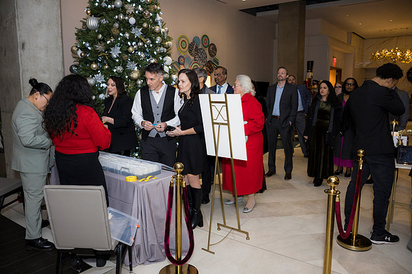 0079__12-5-25__Harmonia-Maveris-Holiday-Party-Wren-Restraurant-Tysons-Virginia-Event-Photojournalism-event-photography