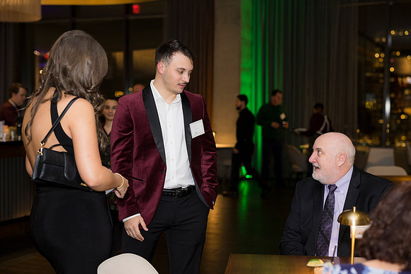 0080__12-5-25__Harmonia-Maveris-Holiday-Party-Wren-Restraurant-Tysons-Virginia-Event-Photojournalism-event-photography