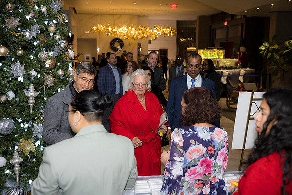 0082__12-5-25__Harmonia-Maveris-Holiday-Party-Wren-Restraurant-Tysons-Virginia-Event-Photojournalism-event-photography