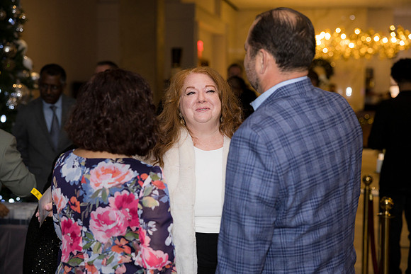 0085__12-5-25__Harmonia-Maveris-Holiday-Party-Wren-Restraurant-Tysons-Virginia-Event-Photojournalism-event-photography