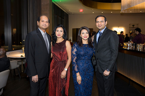 0119__12-5-25__Harmonia-Maveris-Holiday-Party-Wren-Restraurant-Tysons-Virginia-Event-Photojournalism-event-photography