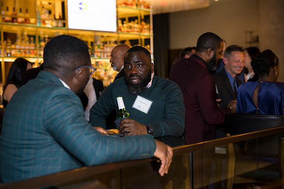 0221__12-5-25__Harmonia-Maveris-Holiday-Party-Wren-Restraurant-Tysons-Virginia-Event-Photojournalism-event-photography