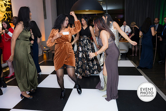 0396__12-5-25__Harmonia-Maveris-Holiday-Party-Wren-Restraurant-Tysons-Virginia-Event-Photojournalism-event-photography