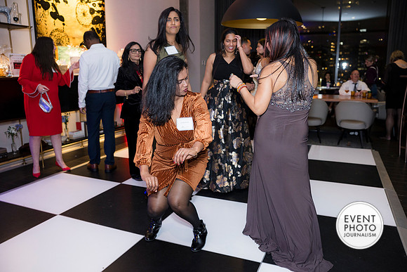 0399__12-5-25__Harmonia-Maveris-Holiday-Party-Wren-Restraurant-Tysons-Virginia-Event-Photojournalism-event-photography